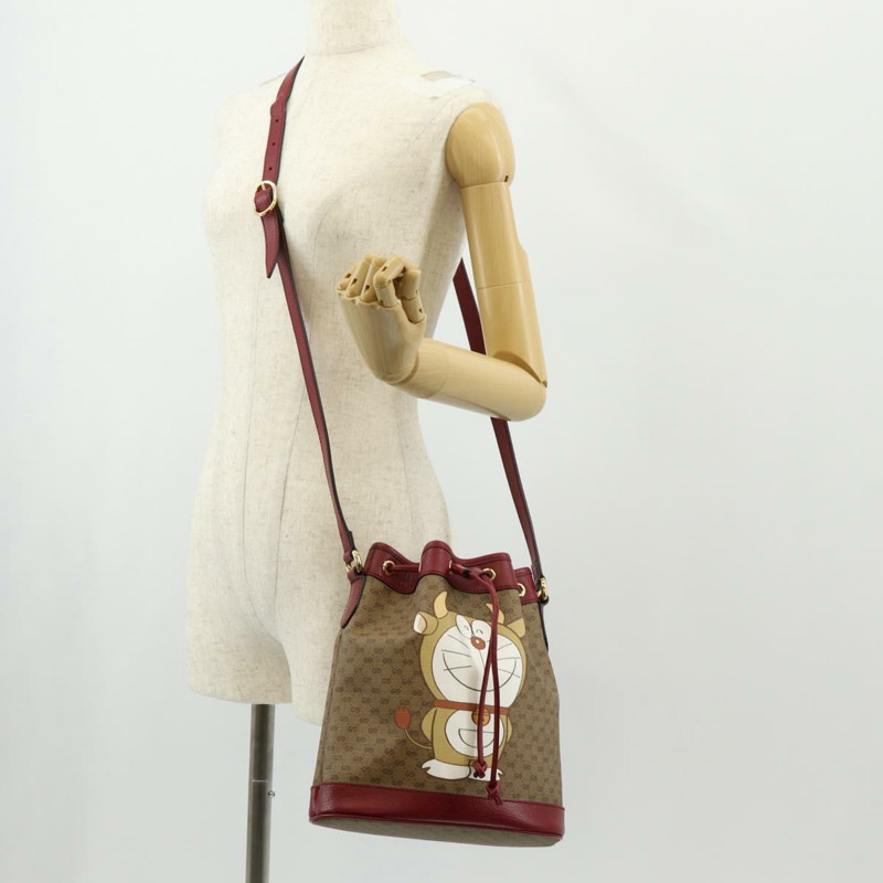【日本直送】GUCCI Micro GG Supreme哆啦A夢聯名手提包 PVC 米色 655597 正品 147572SM-21