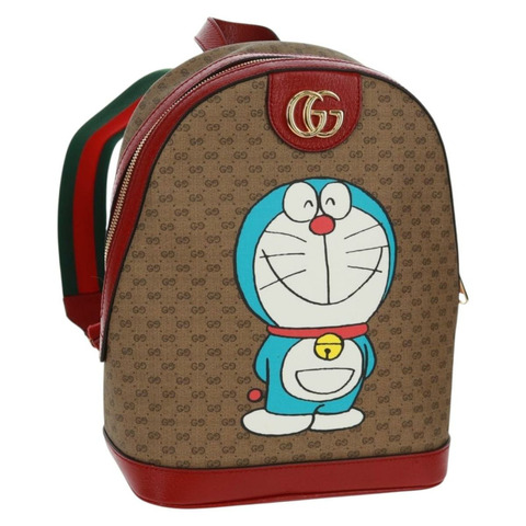GUCCI Micro GG Supreme哆啦A夢雙肩包 PVC 米色 金色 647816 正品 165616SAM