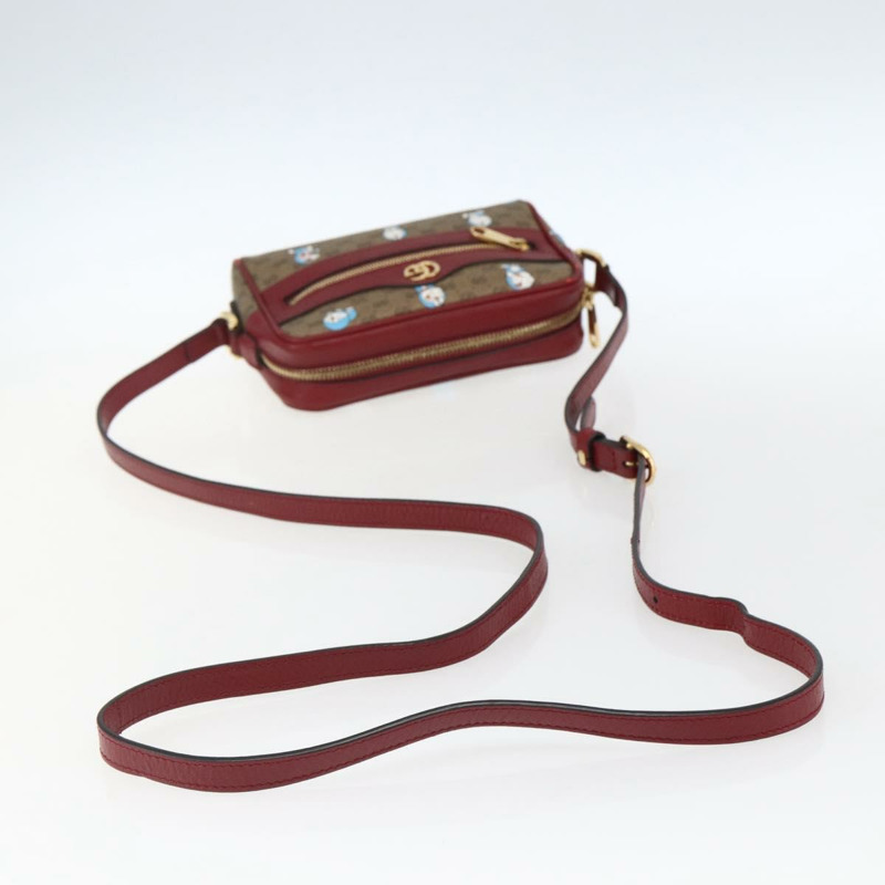 【日本直送】GUCCI GUCCI × Doraemon 聯名版 Micro GG Supreme 包包 PVC 米色 647784 正品 149860SM-6