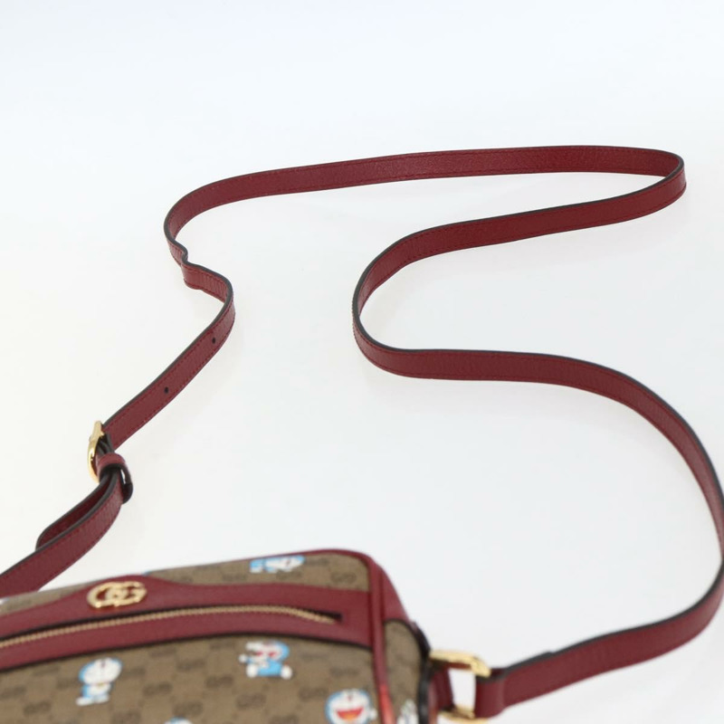 【日本直送】GUCCI GUCCI × Doraemon 聯名版 Micro GG Supreme 包包 PVC 米色 647784 正品 149860SM-7