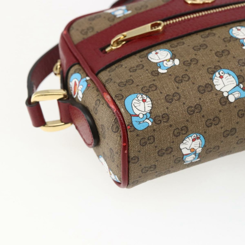 【日本直送】GUCCI GUCCI × Doraemon 聯名版 Micro GG Supreme 包包 PVC 米色 647784 正品 149860SM-13