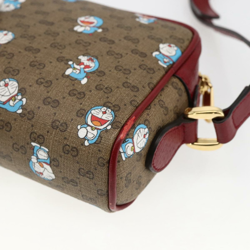 【日本直送】GUCCI GUCCI × Doraemon 聯名版 Micro GG Supreme 包包 PVC 米色 647784 正品 149860SM-14
