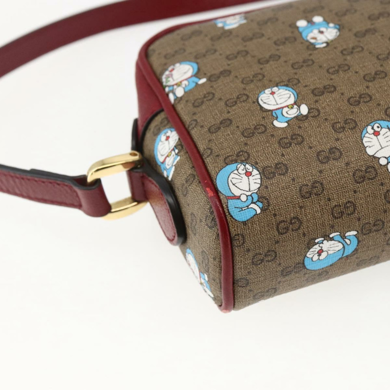 【日本直送】GUCCI GUCCI × Doraemon 聯名版 Micro GG Supreme 包包 PVC 米色 647784 正品 149860SM-15