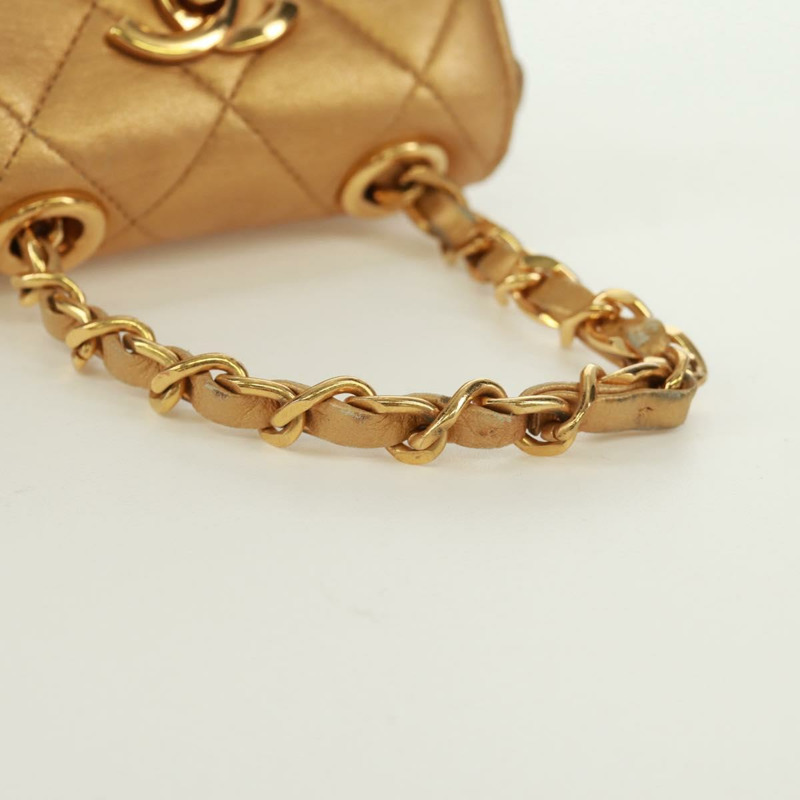 【日本直送】香奈兒迷你絎縫10鏈條手柄羊皮手拿包，金色雙C標誌，貨號165375V-6