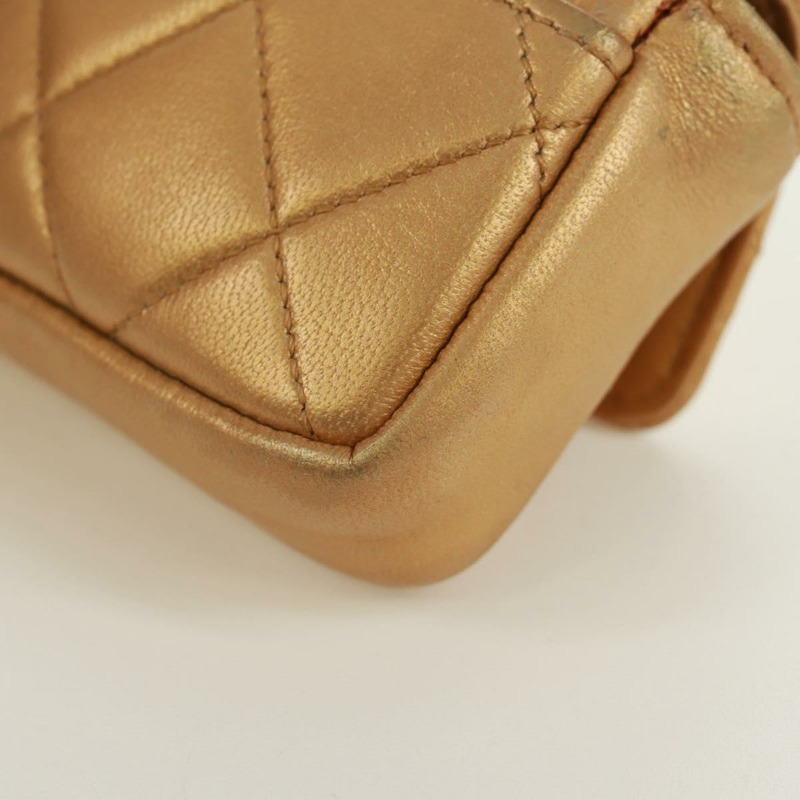 【日本直送】香奈兒迷你絎縫10鏈條手柄羊皮手拿包，金色雙C標誌，貨號165375V-17