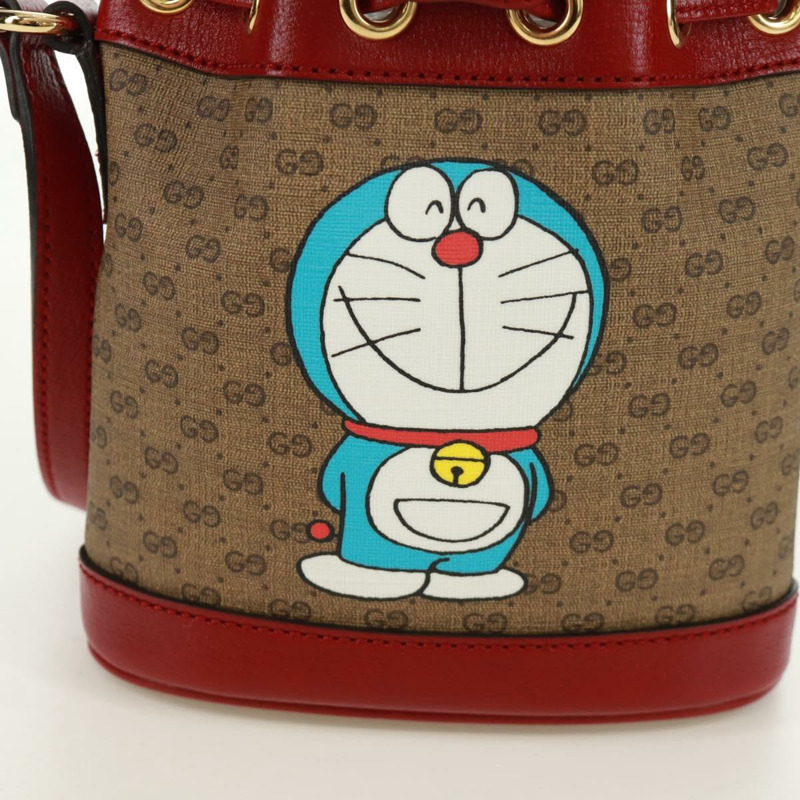 【日本直送】GUCCI GUCCI × Doraemon 聯名款 Micro GG Supreme 手提包 PVC 米色 金色 647801 正品 173166SAM-1