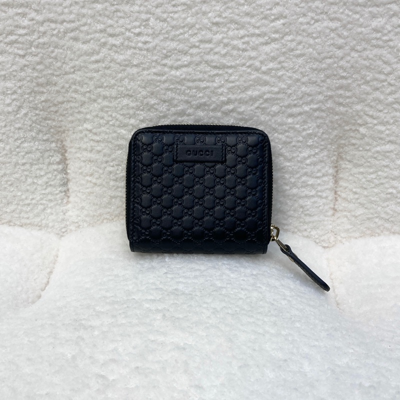 Gucci黑色經典Guccissima壓紋牛皮零錢層釦中短夾449395-1