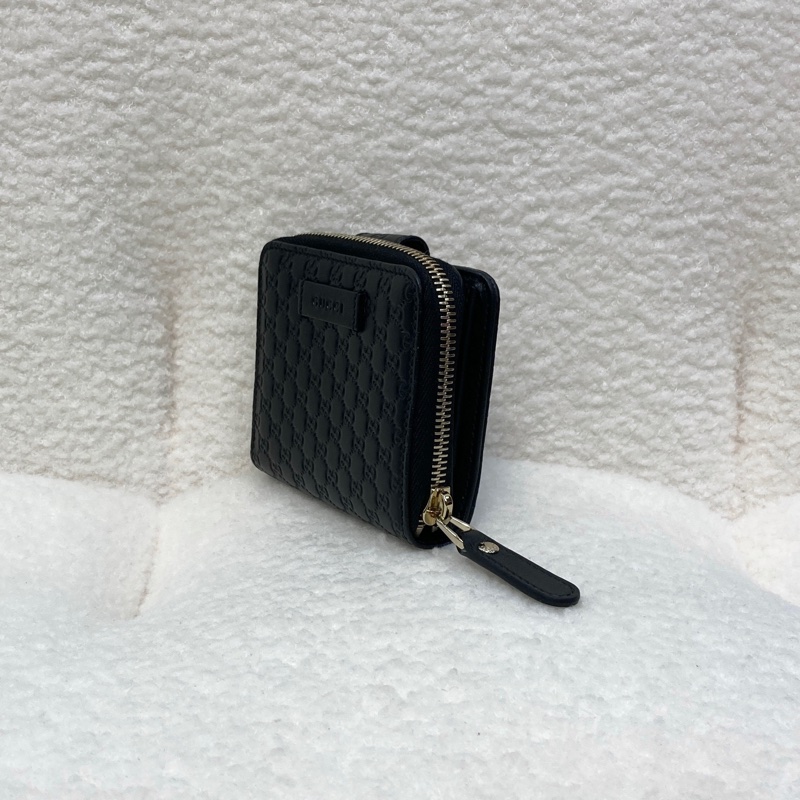 Gucci黑色經典Guccissima壓紋牛皮零錢層釦中短夾449395-2