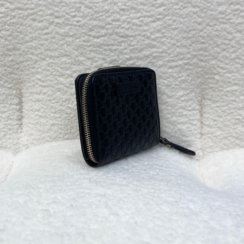 Gucci黑色經典Guccissima壓紋牛皮零錢層釦中短夾449395-3