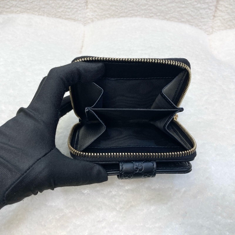 Gucci黑色經典Guccissima壓紋牛皮零錢層釦中短夾449395-6