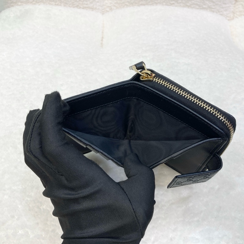 Gucci黑色經典Guccissima壓紋牛皮零錢層釦中短夾449395-9