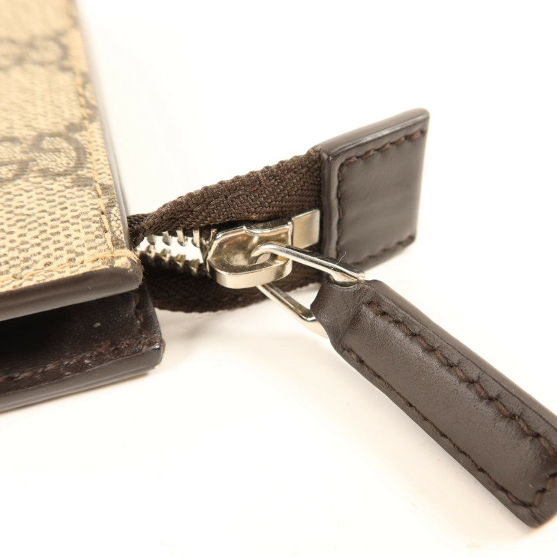 GUCCI 塗層帆布GG Supreme Clutch銀扣手拿包-7