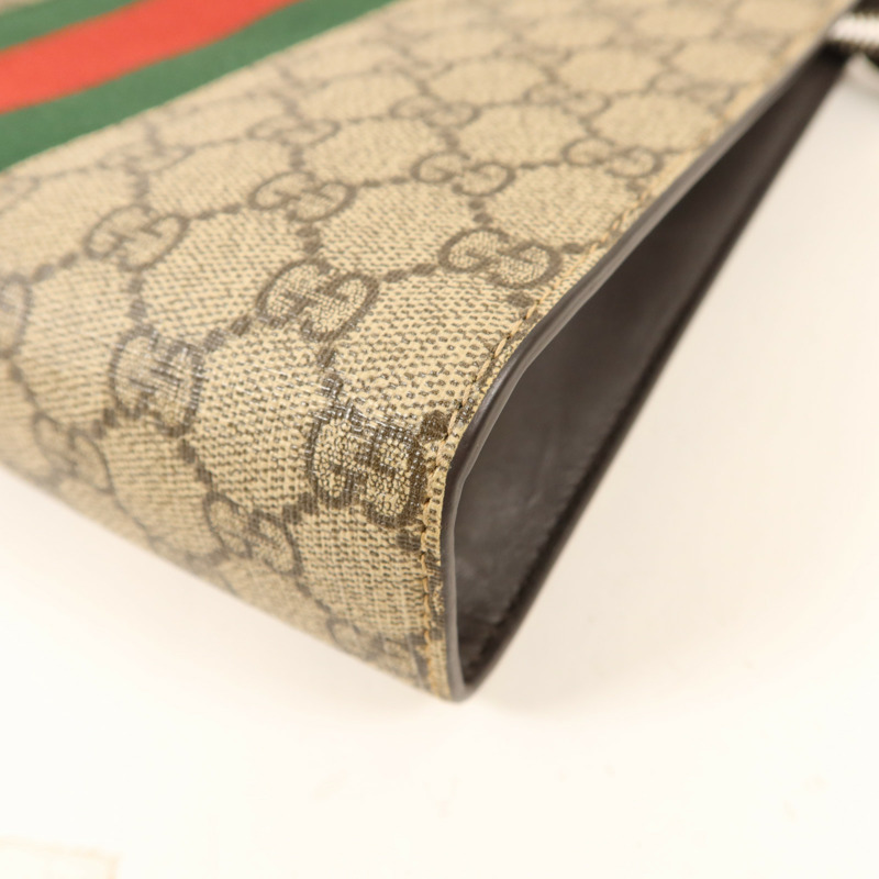 GUCCI 塗層帆布GG Supreme Clutch銀扣手拿包-9