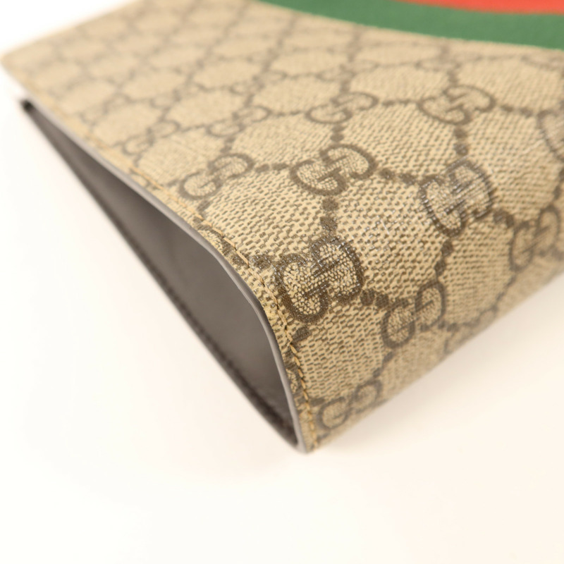 GUCCI 塗層帆布GG Supreme Clutch銀扣手拿包-10