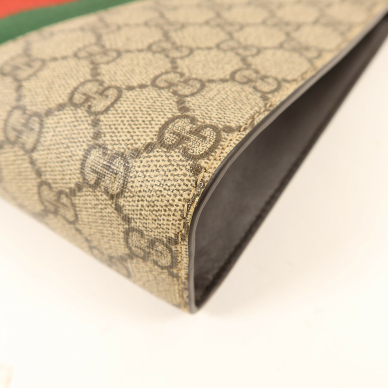 GUCCI 塗層帆布GG Supreme Clutch銀扣手拿包-11