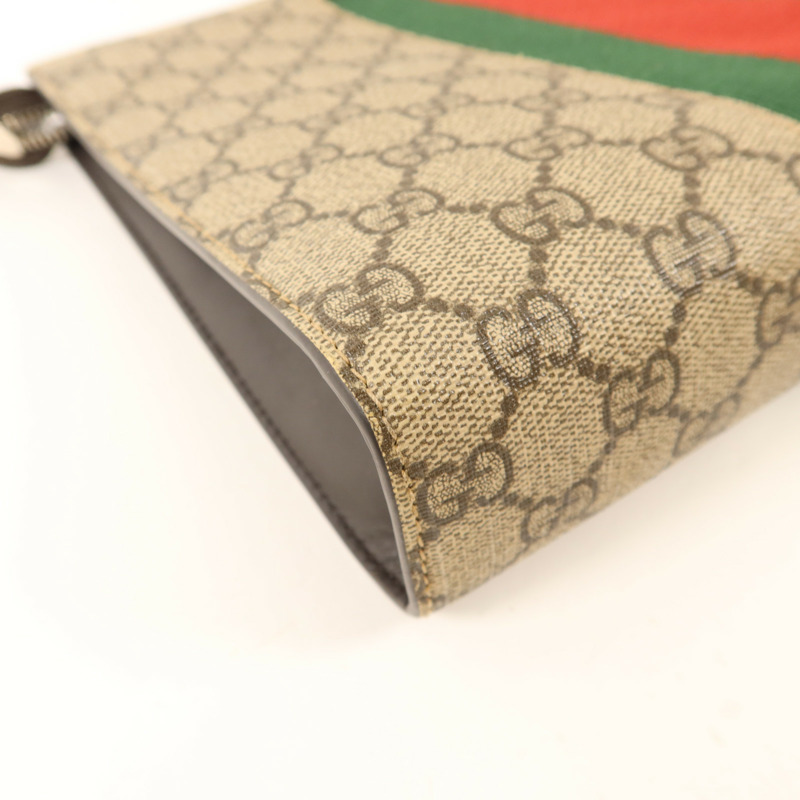 GUCCI 塗層帆布GG Supreme Clutch銀扣手拿包-12