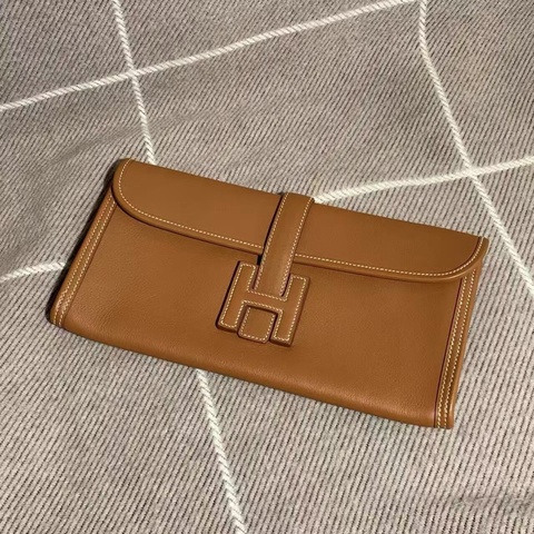 HERMES Jige Elan 29 手拿包金棕色X刻，尺寸：29x15，沒有附件，成色如圖，邊角輕微磨損