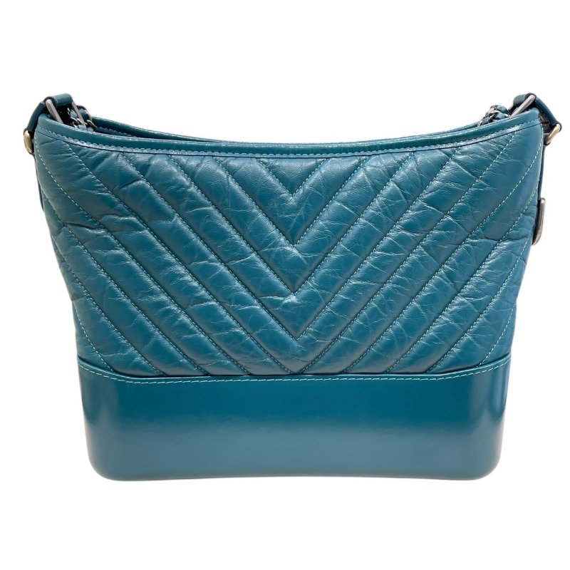 CHANEL 香奈兒 GABRIELLE V字紋 流浪包 皮革 土耳其藍 三色釦-1