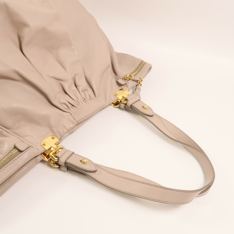 Miu Miu 牛皮皮革Vitello Lux Hobo金扣手挽袋-6