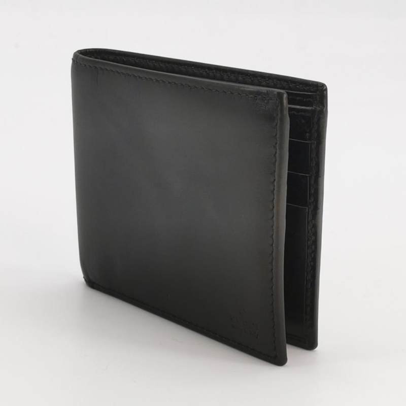 Gucci牛皮純色字母logo壓花對折錢包-1