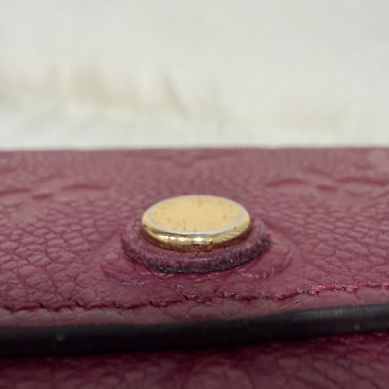 LV M62015 EMILIE 經典花紋全皮革壓紋扣式長夾.葡萄紫 停產-22