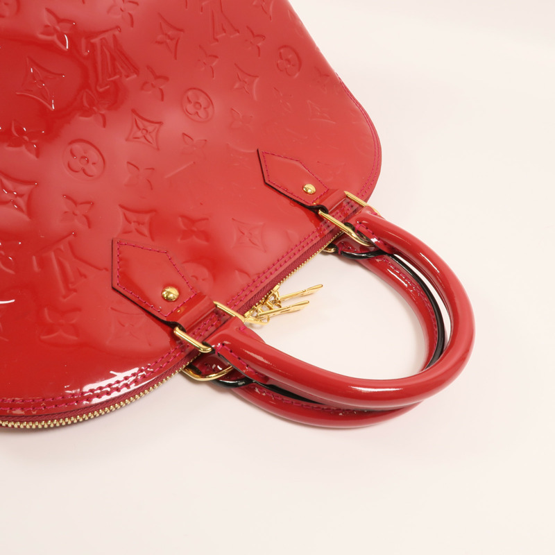 LOUIS VUITTON Monogram Vernis Alma MM金扣手挽袋-7
