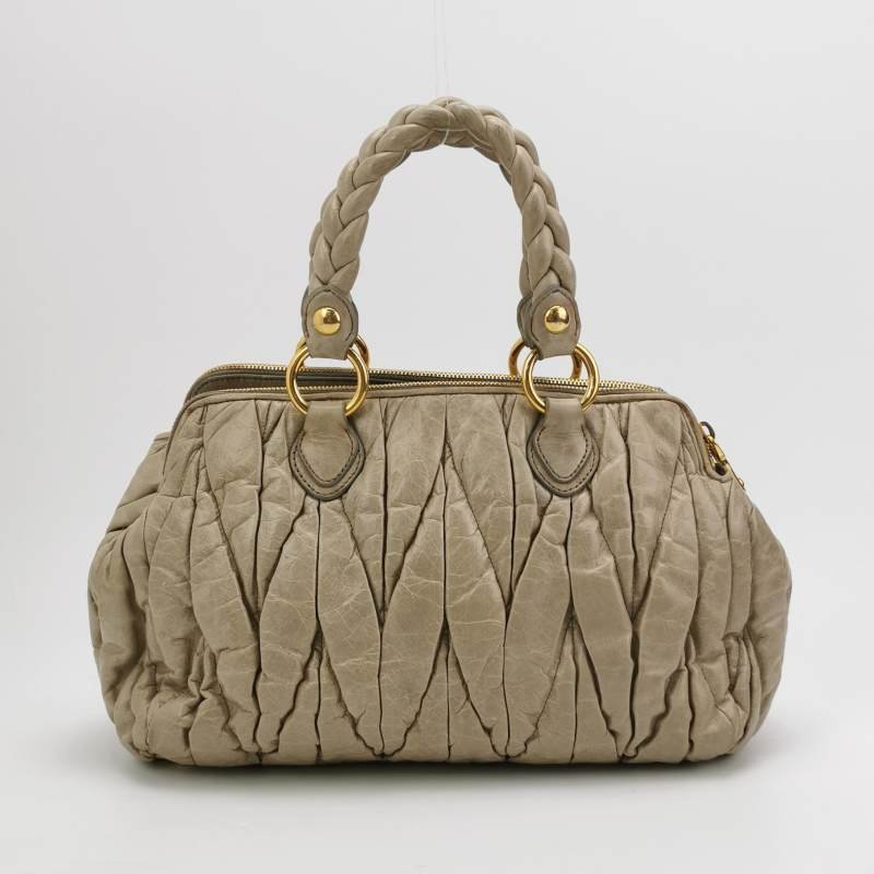 Miu Miu油蠟皮純色絎縫字母logo手提包-4