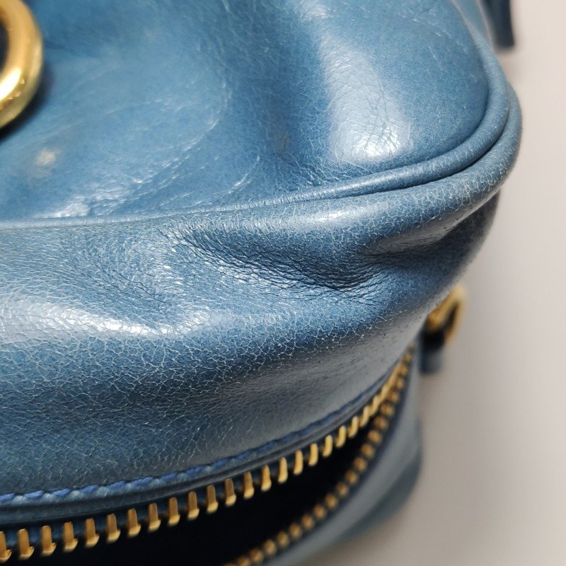 Prada油蠟皮純色字母Logo斜挎包單肩包-17