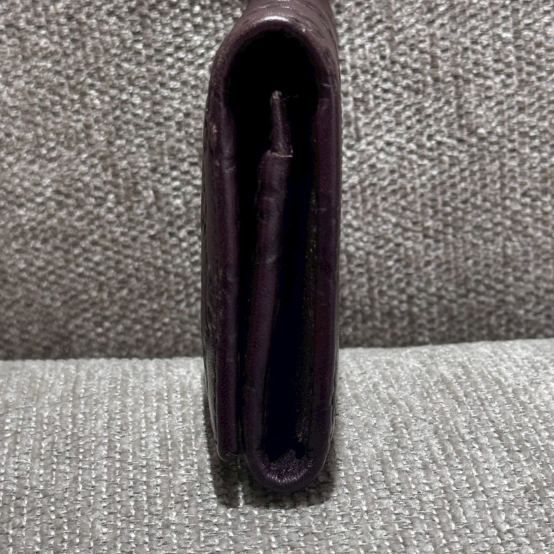 GUCCI GG 壓紋牛皮深棕卡夾包-5