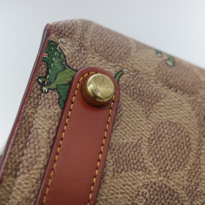 Coach 經典棕色花紋 恐龍太空系列 手提包 斜挎包 兩用包-8