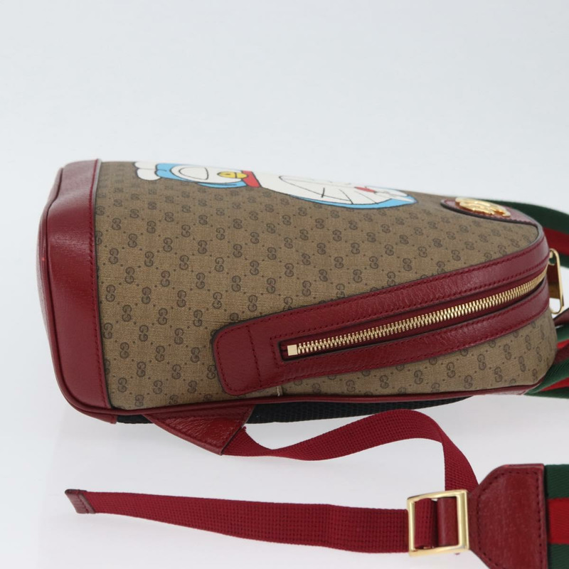 【日本直送】GUCCI Micro GG Supreme哆啦A夢雙肩包 PVC 米色 金色 647816 正品 LNZ825SAM-2