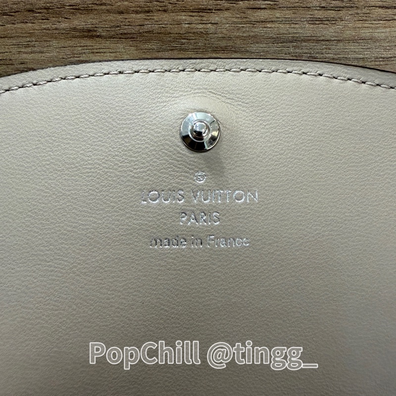 LV 石灰色打孔通花Iris銀釦下蓋短夾M62542-7