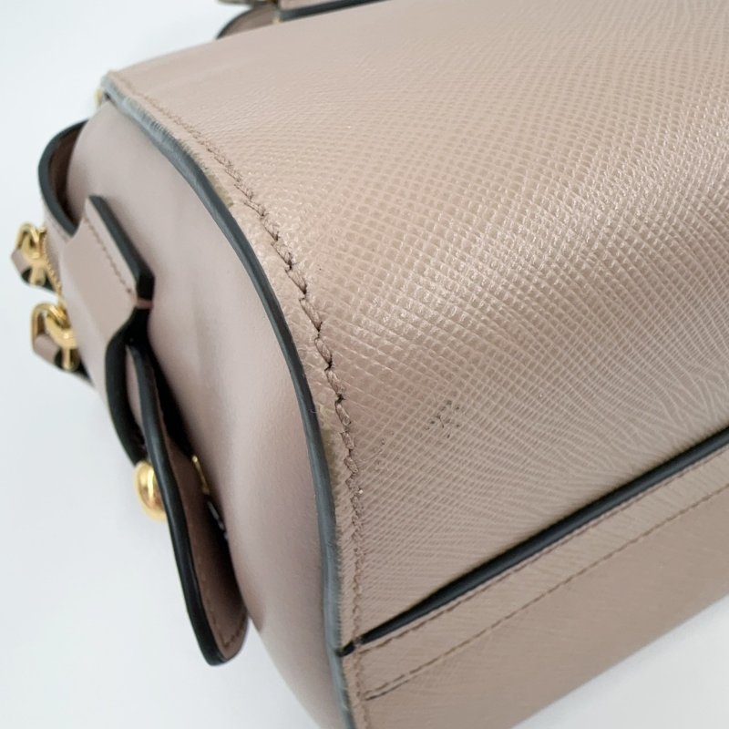 PRADA粉膚防刮牛皮金釦手提側背殺手包1BA164-10