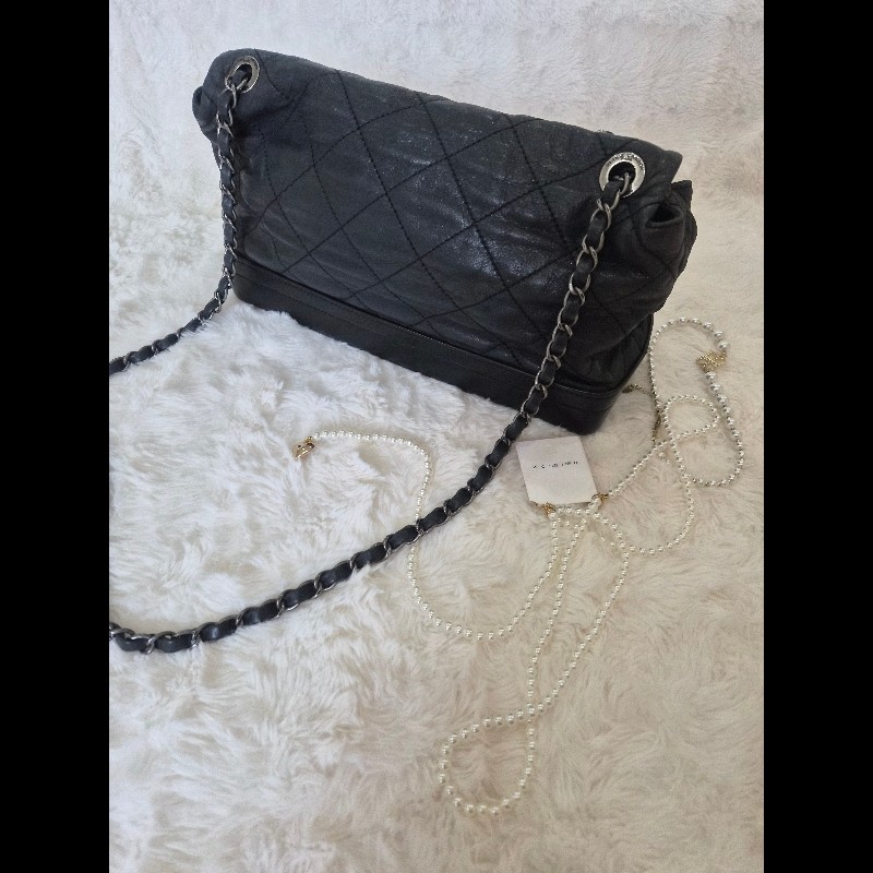 Chanel 黑銀牛皮硬底流浪機場包-1