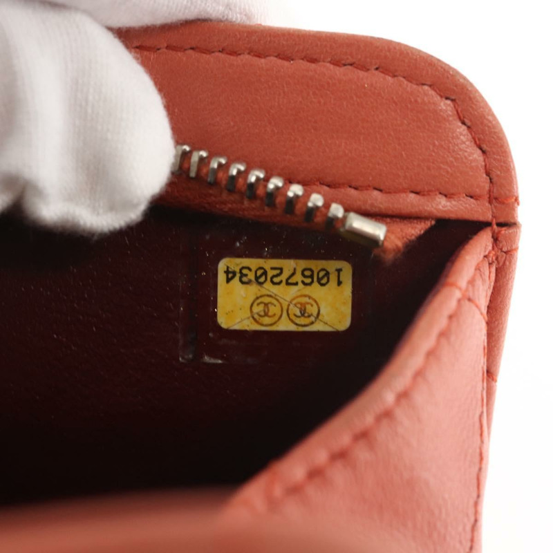 【日本直送】香奈兒 (CHANEL) 絎縫羊皮手拿包 橘色 銀色 CC 認證 144810A-11