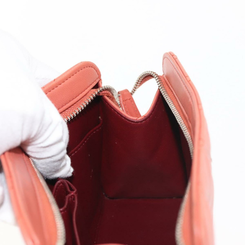 【日本直送】香奈兒 (CHANEL) 絎縫羊皮手拿包 橘色 銀色 CC 認證 144810A-18