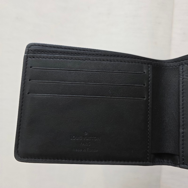 [甜價出品項🥰專櫃五折以下] LV黑牛皮壓紋Multiple對開短夾-5