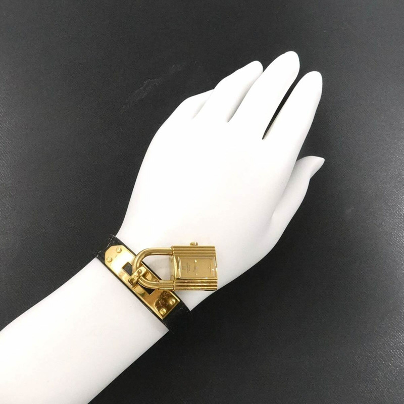 愛馬仕凱莉女士腕錶，金色和黑色石英錶，帶掛鎖-2