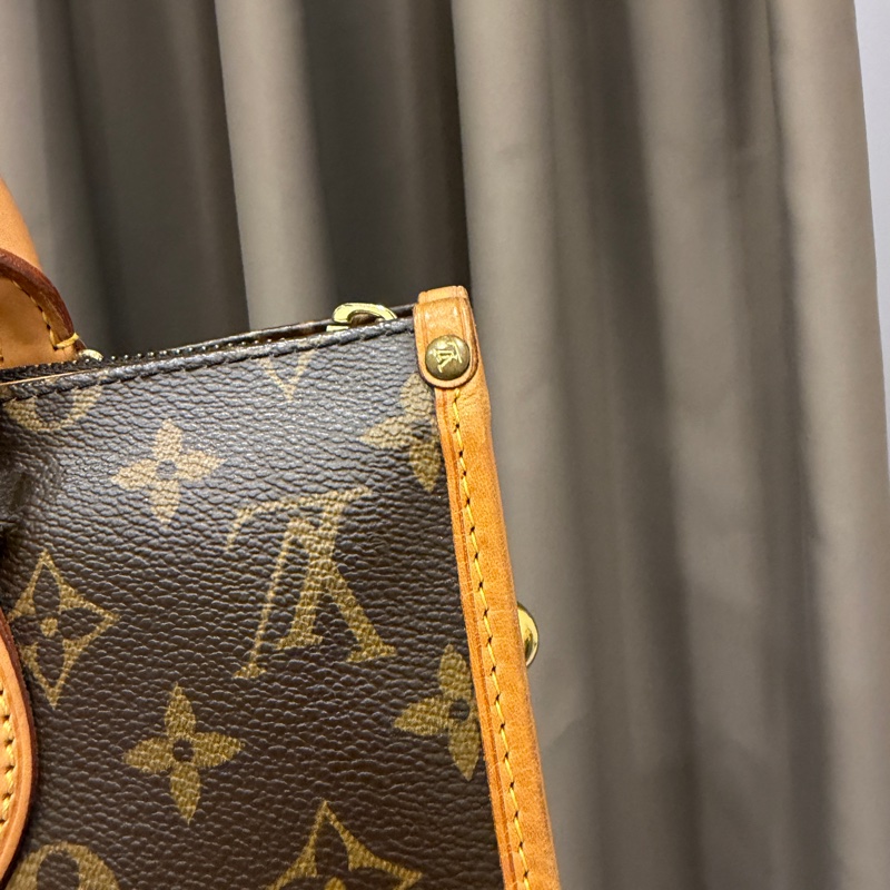 LV 原花金球三角手提包M40009-10