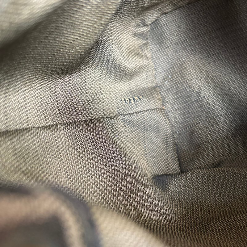 ::FENDI:: 經典緹花拼接皮革抽繩水桶包 斜背包 肩背包-33