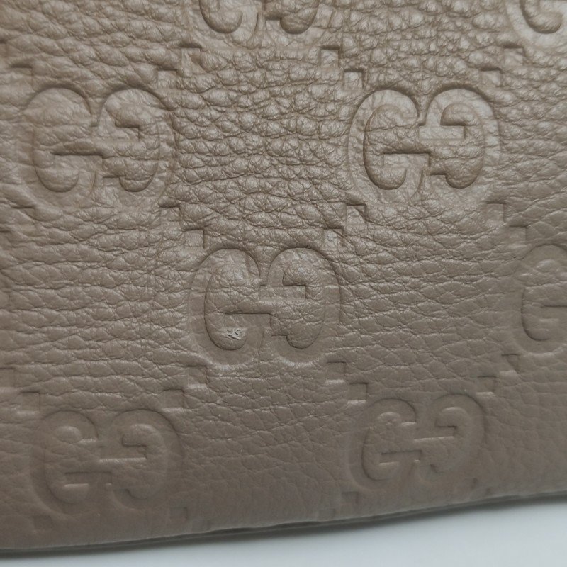 Gucci GG Emblem小號牛皮純色老花壓紋斜挎 包單肩包-10