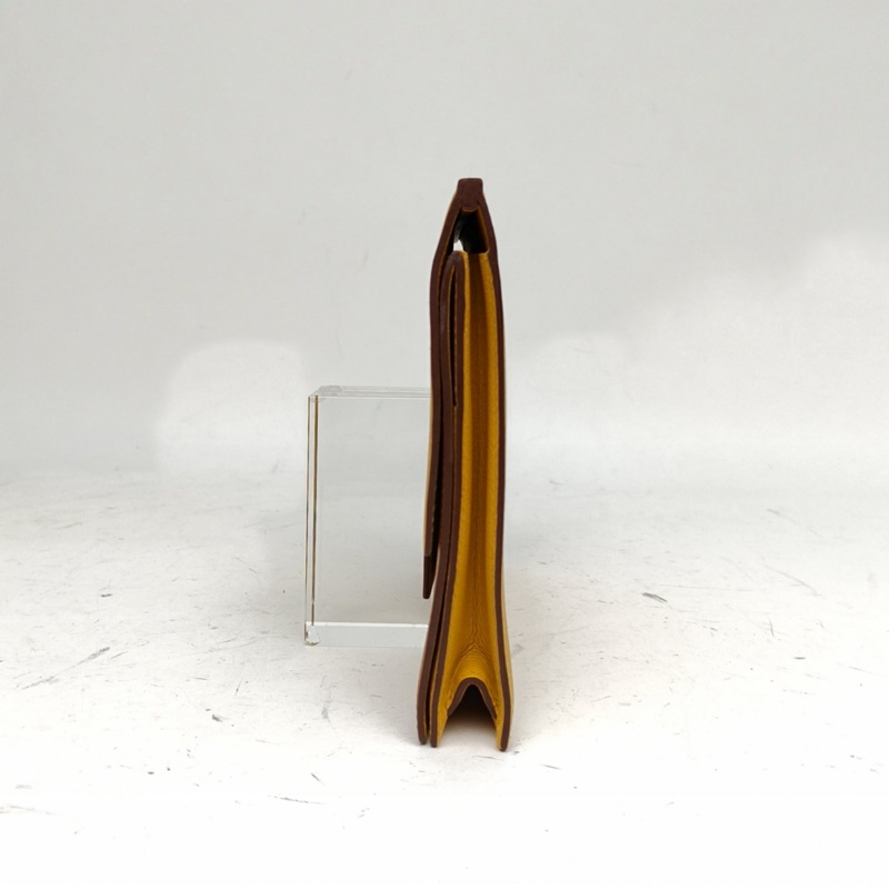 HERMES 琥珀黃EC皮A刻Multiplis手拿包-1