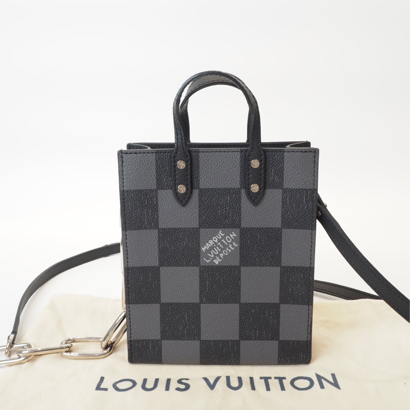 LV日落系列棋盤格琴譜斜背包-0