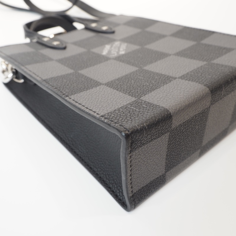 LV日落系列棋盤格琴譜斜背包-11