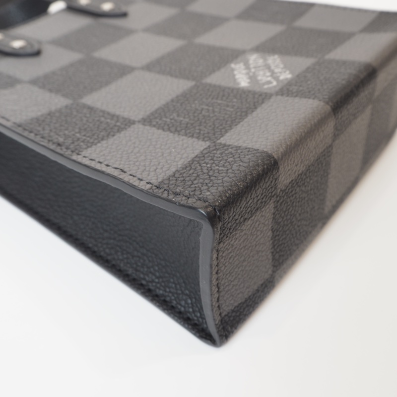 LV日落系列棋盤格琴譜斜背包-13