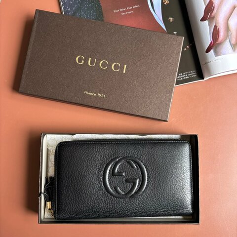 ::GUCCI:: 291102 Soho黑色皮革雙G壓紋流蘇拉鍊長夾