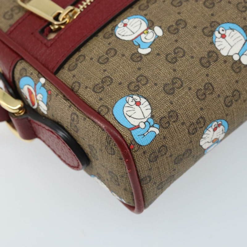 【日本直送】GUCCI Micro GG Supreme哆啦A夢包 PVC 米色 金色 647784 正品 ka3475SAM-13