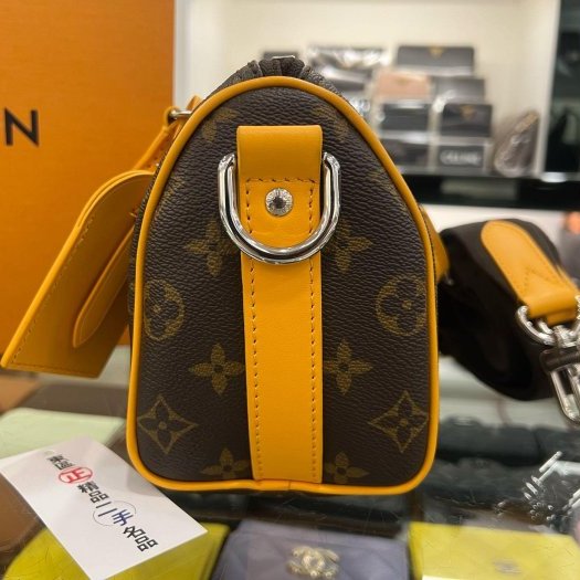 東區正精品㊣LV M12733 KEEPALL BANDOULIÈRE 25CM 字紋拼橘色皮革手提斜背兩用包 RZ6361-3