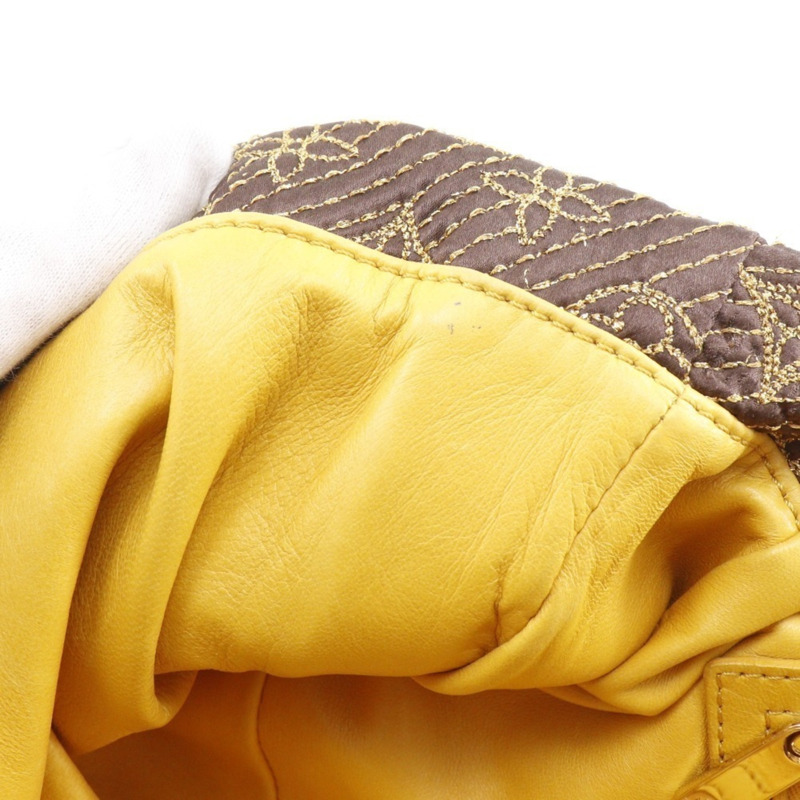 Louis Vuitton African Queen 手拿包，提花 Monogram 緞面，2009 年款，棕色，RE0039，A5 尺寸，磁扣，女士款。-11