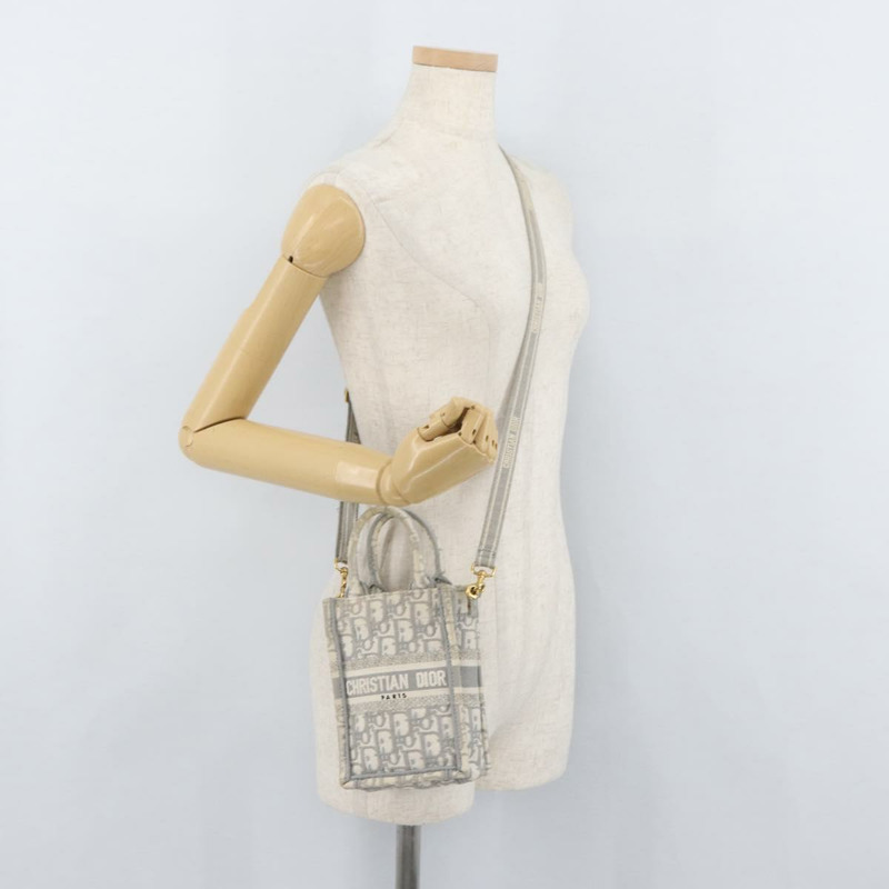 【日本直送】Christian Dior Trotter帆布書本手袋筆型迷你包兩用正品 BAZ782A-21